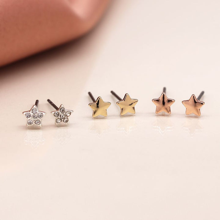 Set of three star-shaped gold and silver stud earrings from POM Jewellery by Cornucopia Home and Gift.