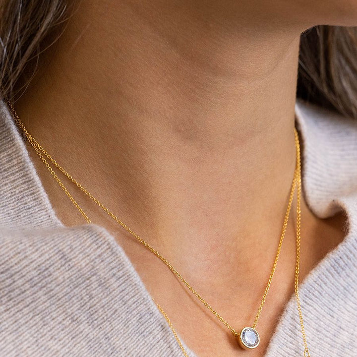 Gold plated crystal necklace from POM Jewellery by Cornucopia Home and Gift, featuring a delicate chain with sparkling crystal accents.