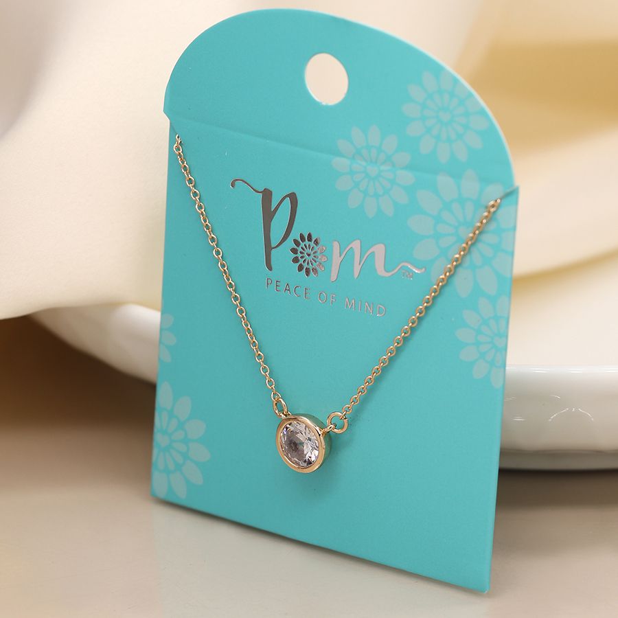 Gold-plated crystal necklace from POM Jewellery by Cornucopia Home and Gift, featuring sparkling crystals and elegant design.