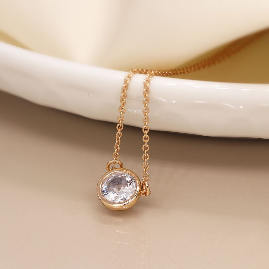Gold plated crystal necklace from POM Jewellery by Cornucopia Home and Gift, featuring a delicate chain with sparkling crystal accents.