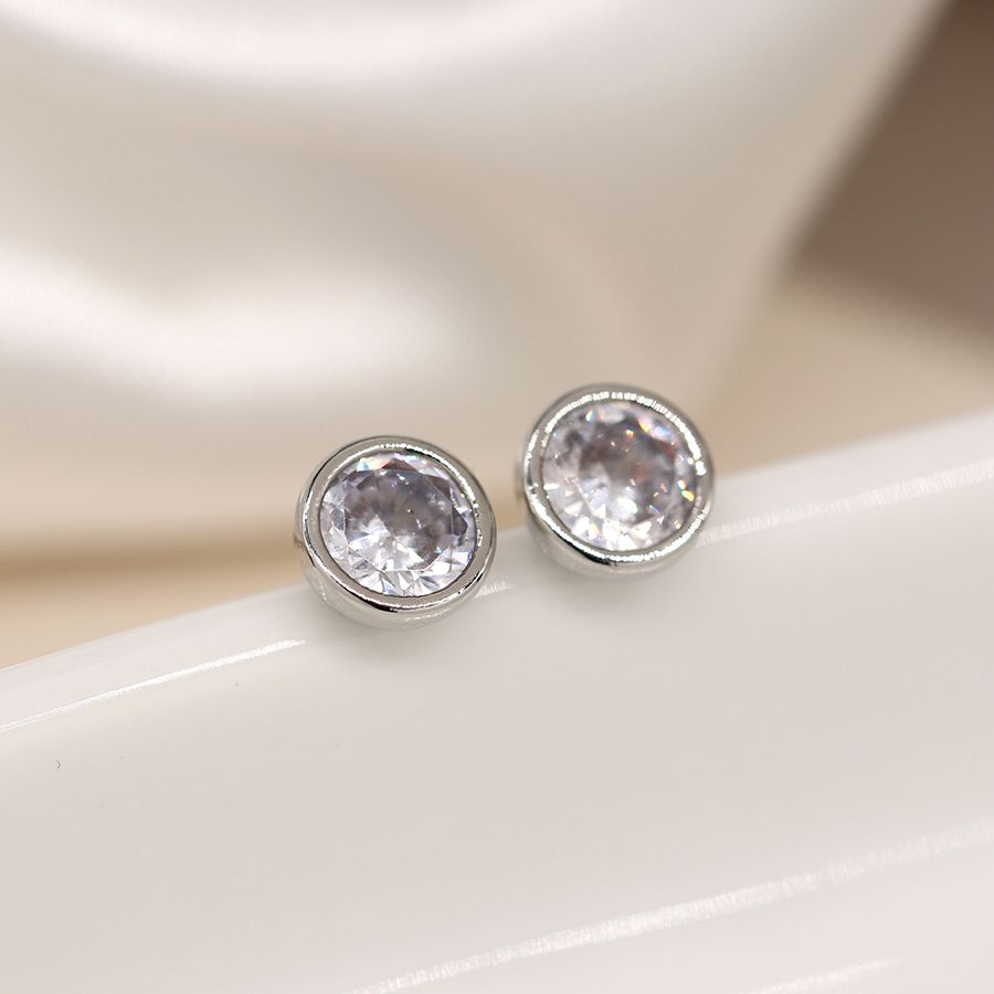 Round silver-plated crystal stud earrings from POM Jewellery by Cornucopia Home and Gift, featuring sparkling gemstone accents.
