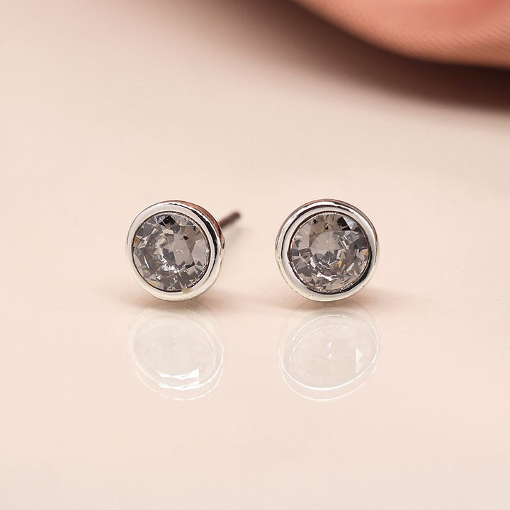 Silver plated round stud earrings with crystal accents from POM Jewellery by Cornucopia Home and Gift.
