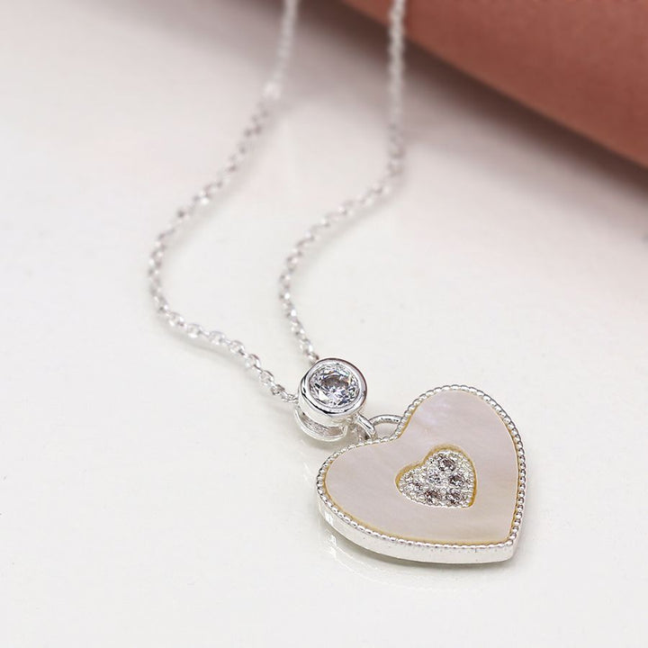 Silver heart necklace from POM Jewellery by Cornucopia Home and Gift, featuring a delicate heart pendant on a chain.