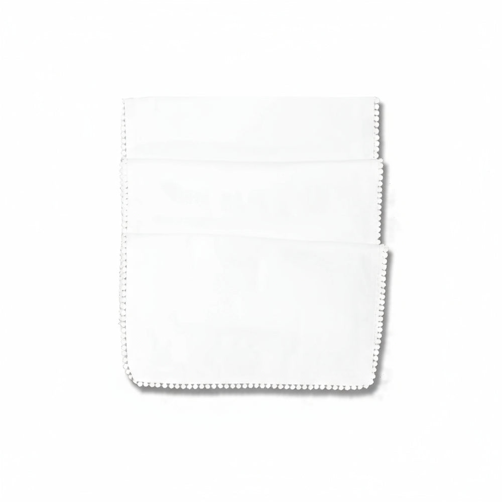 Pearl white table runner with French knot detailing by Cornucopia Home and Gift, perfect for elegant table decor.