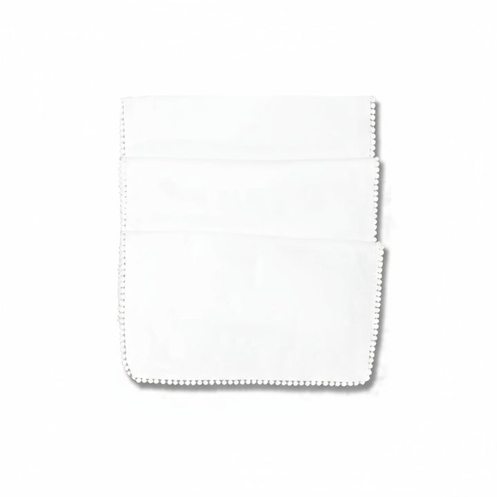 Pearl white table runner with French knot detailing by Cornucopia Home and Gift, perfect for elegant table decor.
