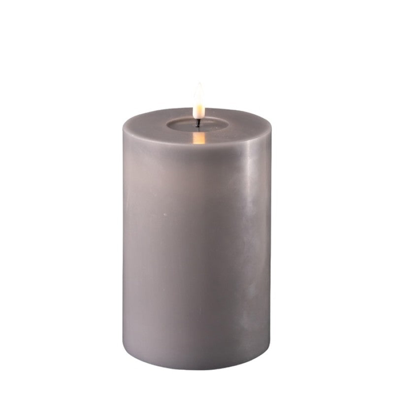 Gray LED dinner candle, 10x15cm, from Cornucopia Home and Gift's Deluxe Home Art collection, showing a realistic flickering glow.