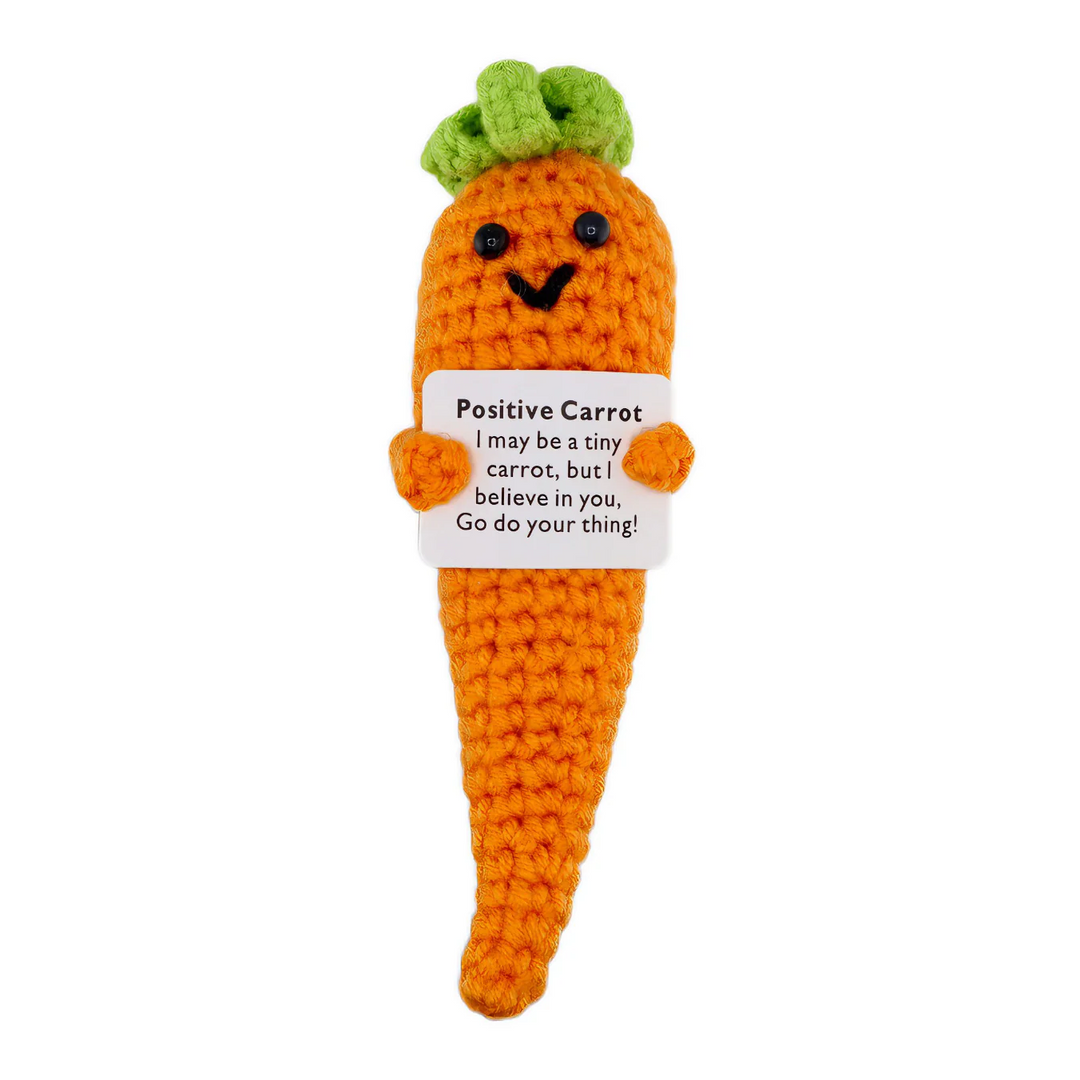 Crochet carrot vegetable from The Gnome Garden by Cornucopia Home and Gift, featuring realistic orange carrot with green leafy top.