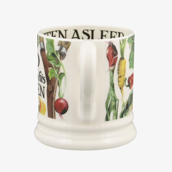 Emma Bridgewater Dad Loves His Garden ½ pint ceramic mug with garden-themed design and blue and white floral pattern.
