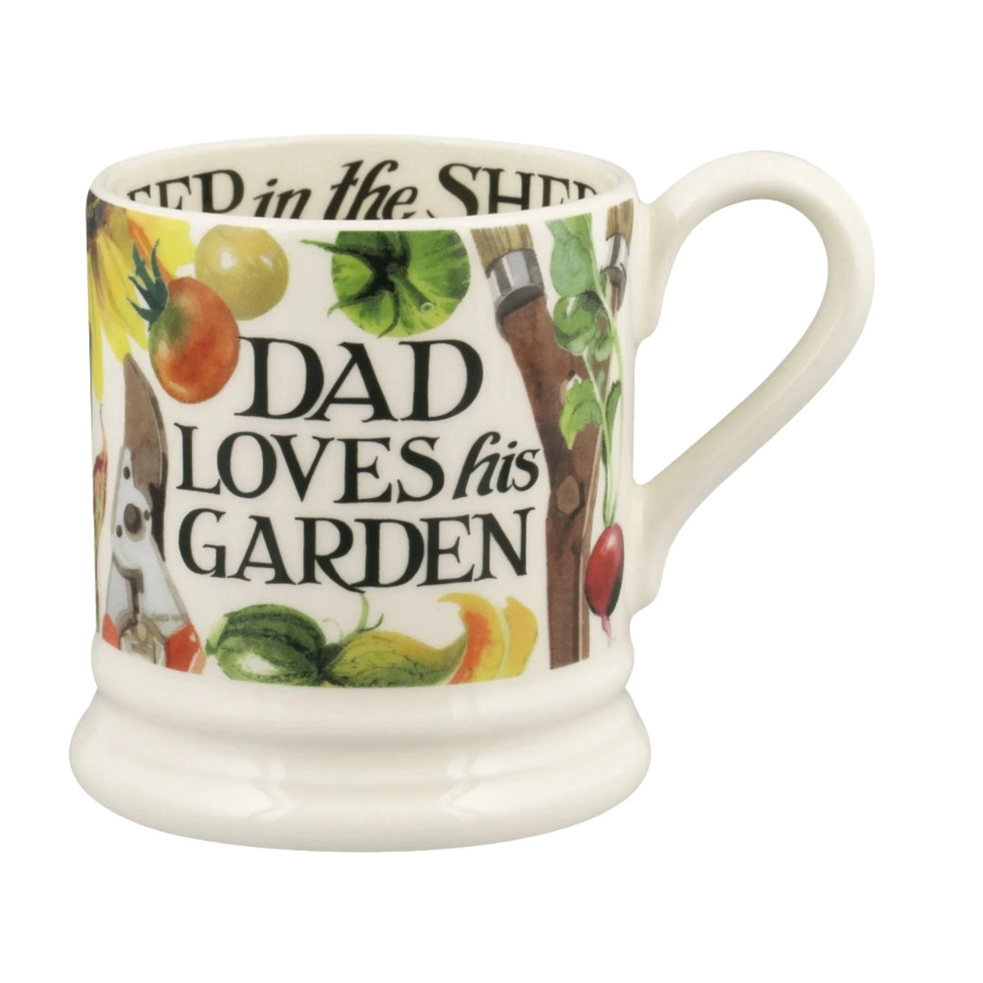 Emma Bridgewater Dad Loves His Garden ½ Pint Mug with garden-themed design, featuring bold text and colorful illustrations.