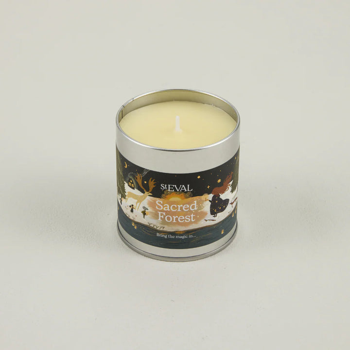 St Eval Christmas Sacred Forest scented tin candle with festive forest design, ideal for holiday home decor and aromatic ambiance.