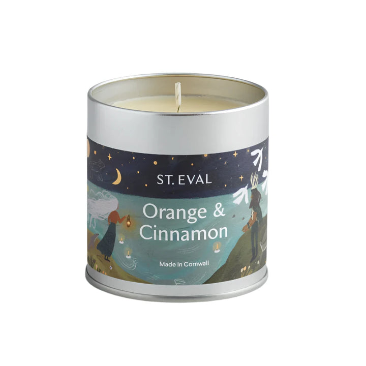 St Eval Christmas orange and cinnamon tin candle with festive orange and cinnamon scent in a decorative tin container.