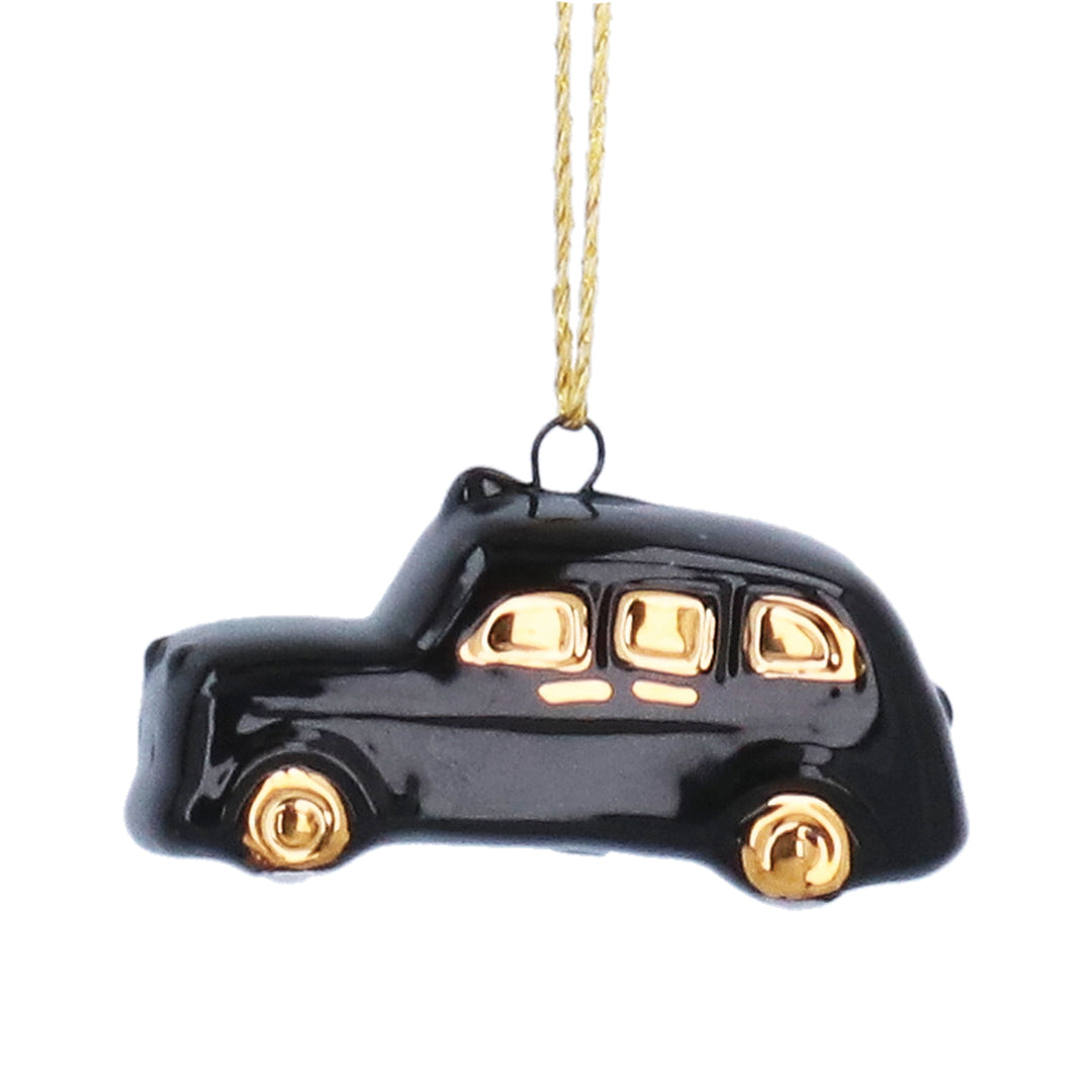 Gisela Graham London Taxi ceramic decoration for Christmas, featuring a detailed yellow taxi design, ideal for holiday decor.