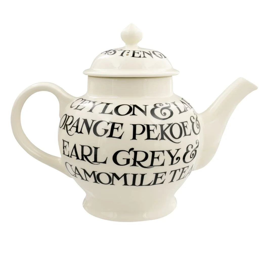Emma Bridgewater Black Toast 4 Mug Teapot in box, featuring classic black and white toast pattern, ceramic material, and detailed design.
