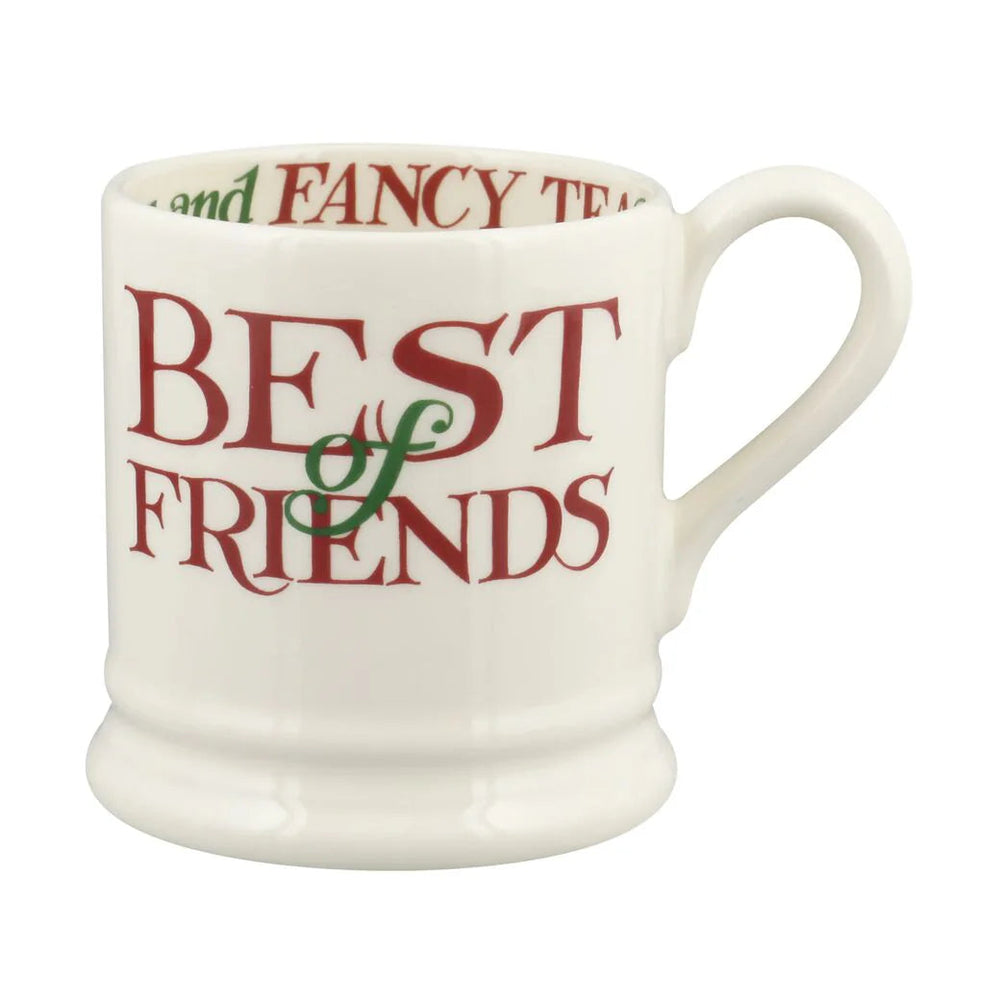 Emma Bridgewater Christmas Toast Best Of Friends 1/2 pint mug with festive toast and friends design on white ceramic.