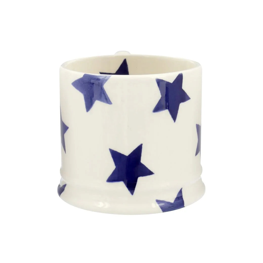 Emma Bridgewater Blue Star small ceramic mug with blue star pattern and a smooth handle, perfect for enjoying hot beverages.