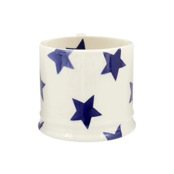 Emma Bridgewater Blue Star small ceramic mug with blue star pattern and a smooth handle, perfect for enjoying hot beverages.