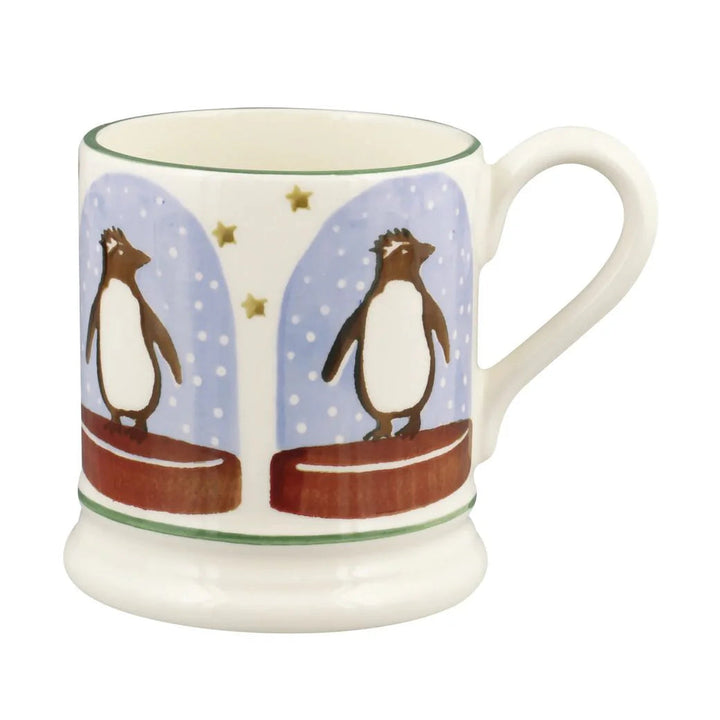 Emma Bridgewater Penguin Snow Globe Half Pint Mug with festive snow globe and penguin design, perfect for Christmas celebrations.