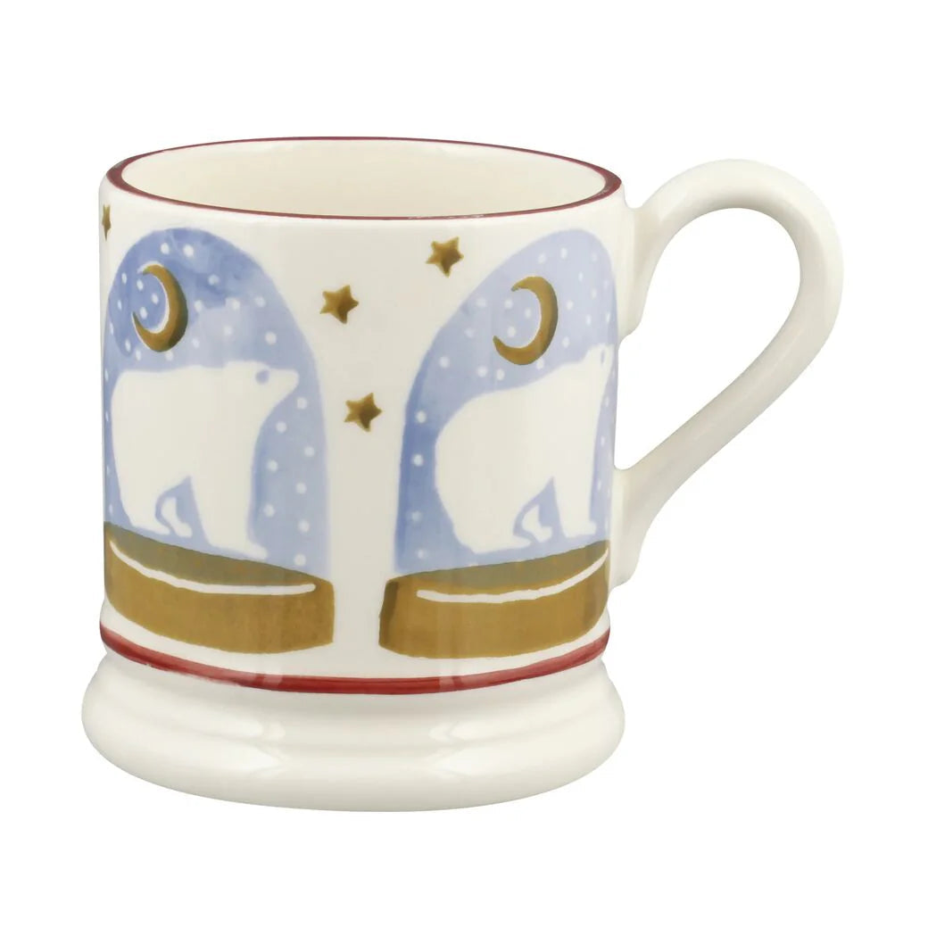 Emma Bridgewater Christmas snow globe mug featuring a polar bear design on a half pint ceramic cup.