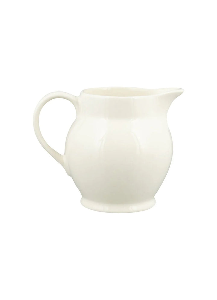 Emma Bridgewater Black Toast ½ Pint Jug featuring a black and cream toast pattern, ideal for serving or decorative use.