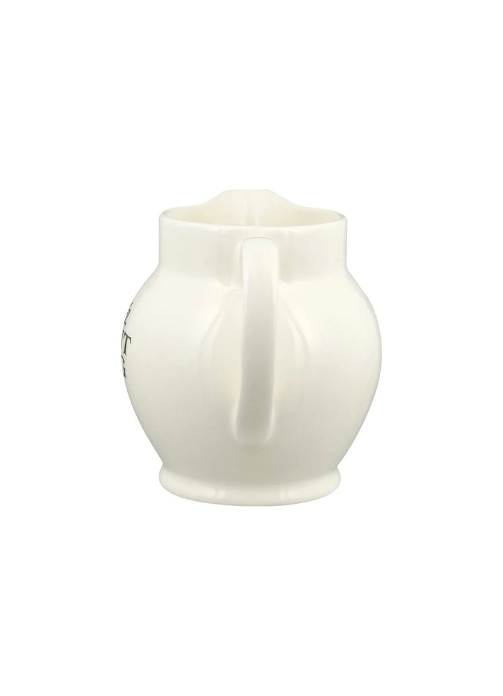 Emma Bridgewater Black Toast ½ Pint ceramic jug with black and white toast pattern, ideal for kitchen or table use.