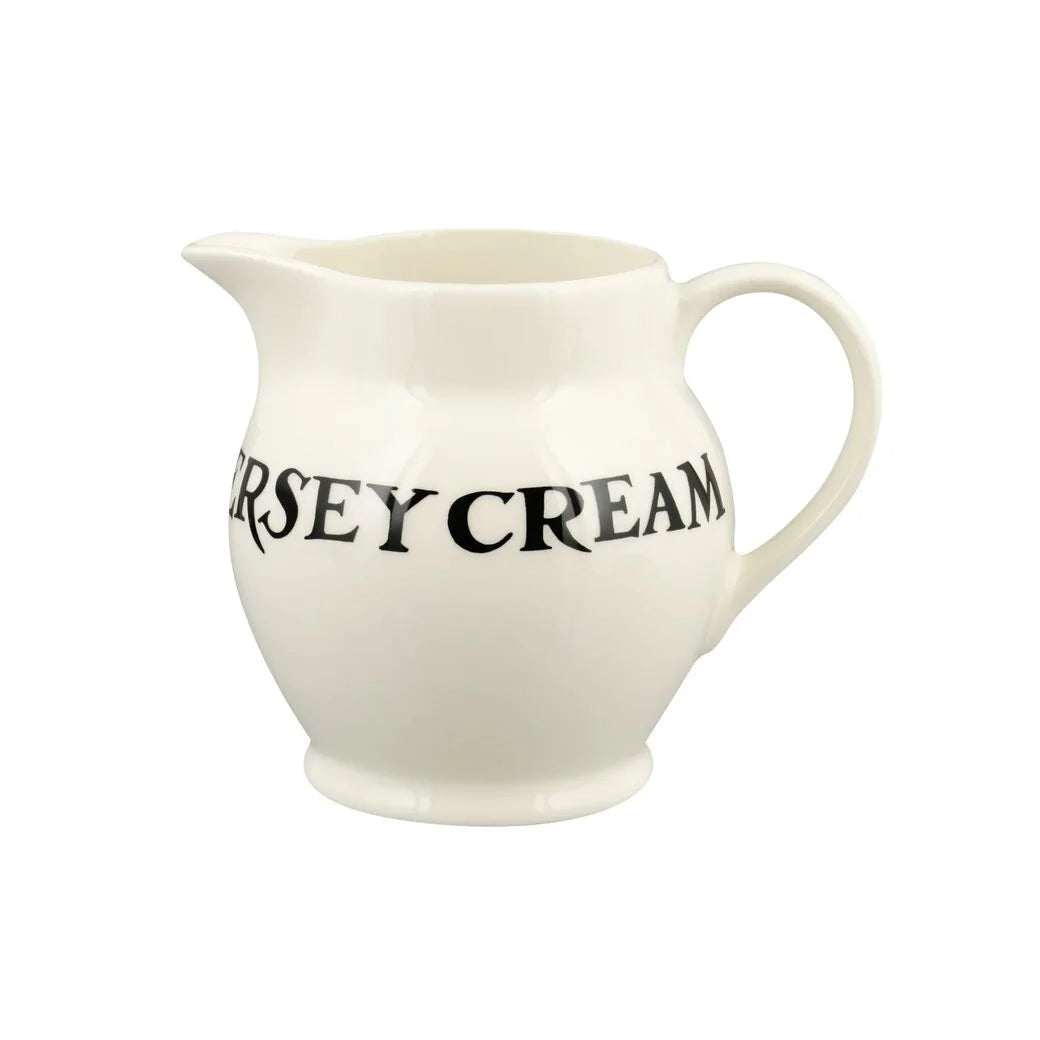 Emma Bridgewater Black Toast Jersey Cream ½ pint ceramic jug with black toast pattern and cream background, classic and stylish design.
