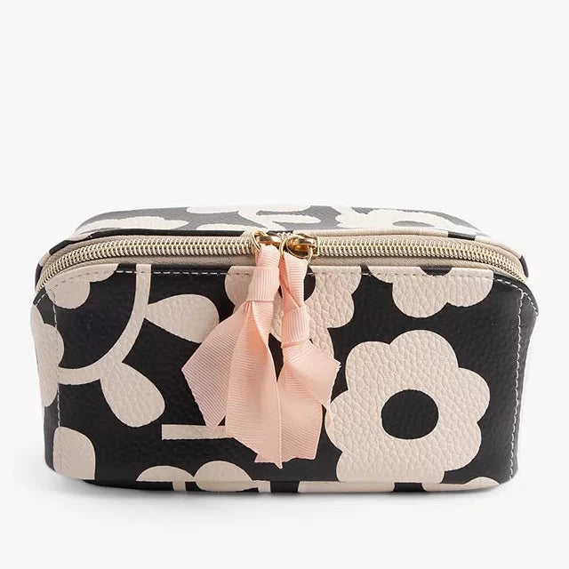 Caroline Gardner Mono Flower makeup organiser with multiple compartments for cosmetics, designed by Cornucopia Home and Gift.