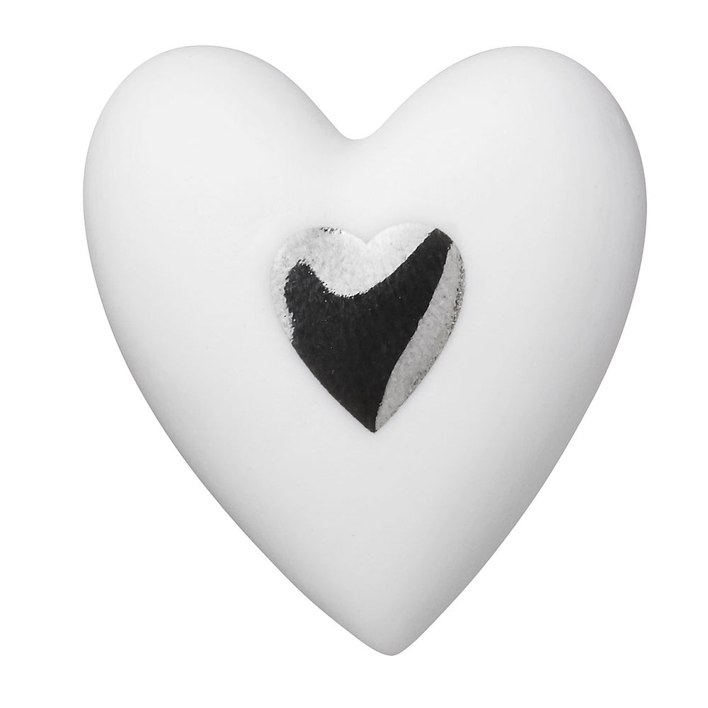 Heart-shaped Radër from Räder Love to go by Cornucopia Home and Gift, featuring a charming pink heart design.
