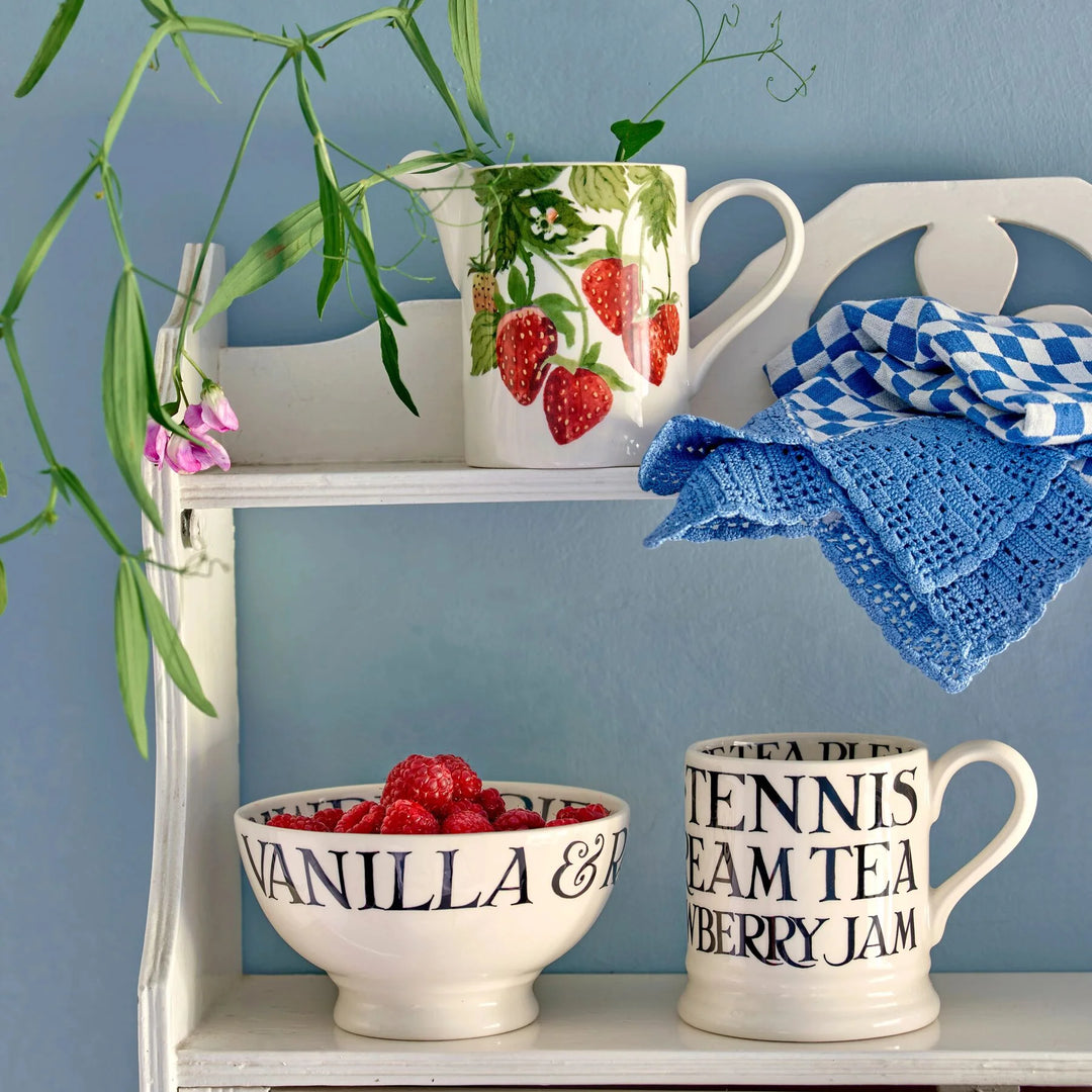 Emma Bridgewater Black Toast strawberries and cream French bowl with floral pattern, featuring strawberries and cream design.