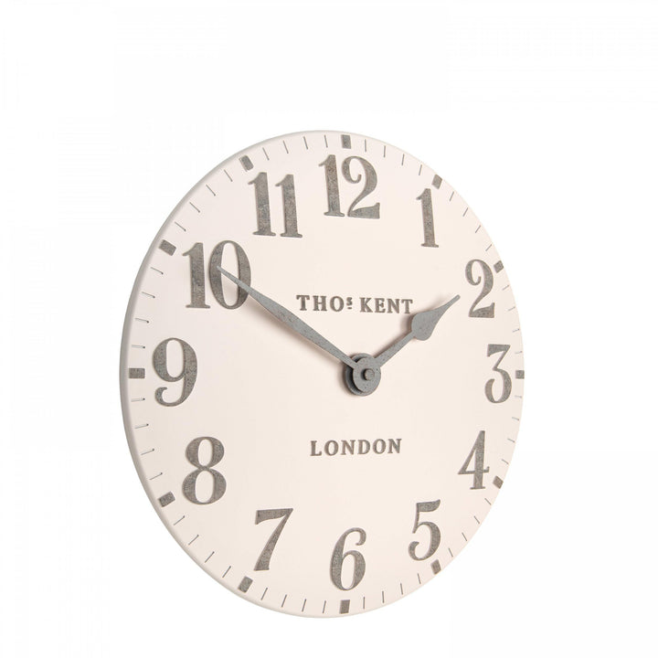 Pink 12-foot Arabic wall clock by Cornucopia Home and Gift, featuring bold numerals and a modern art-inspired design.