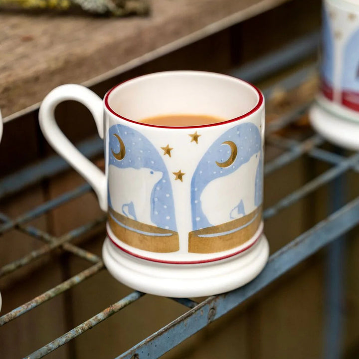 Emma Bridgewater Christmas Polar Bear Snow Globe Half Pint Mug with festive snow globe design and winter scene artwork.