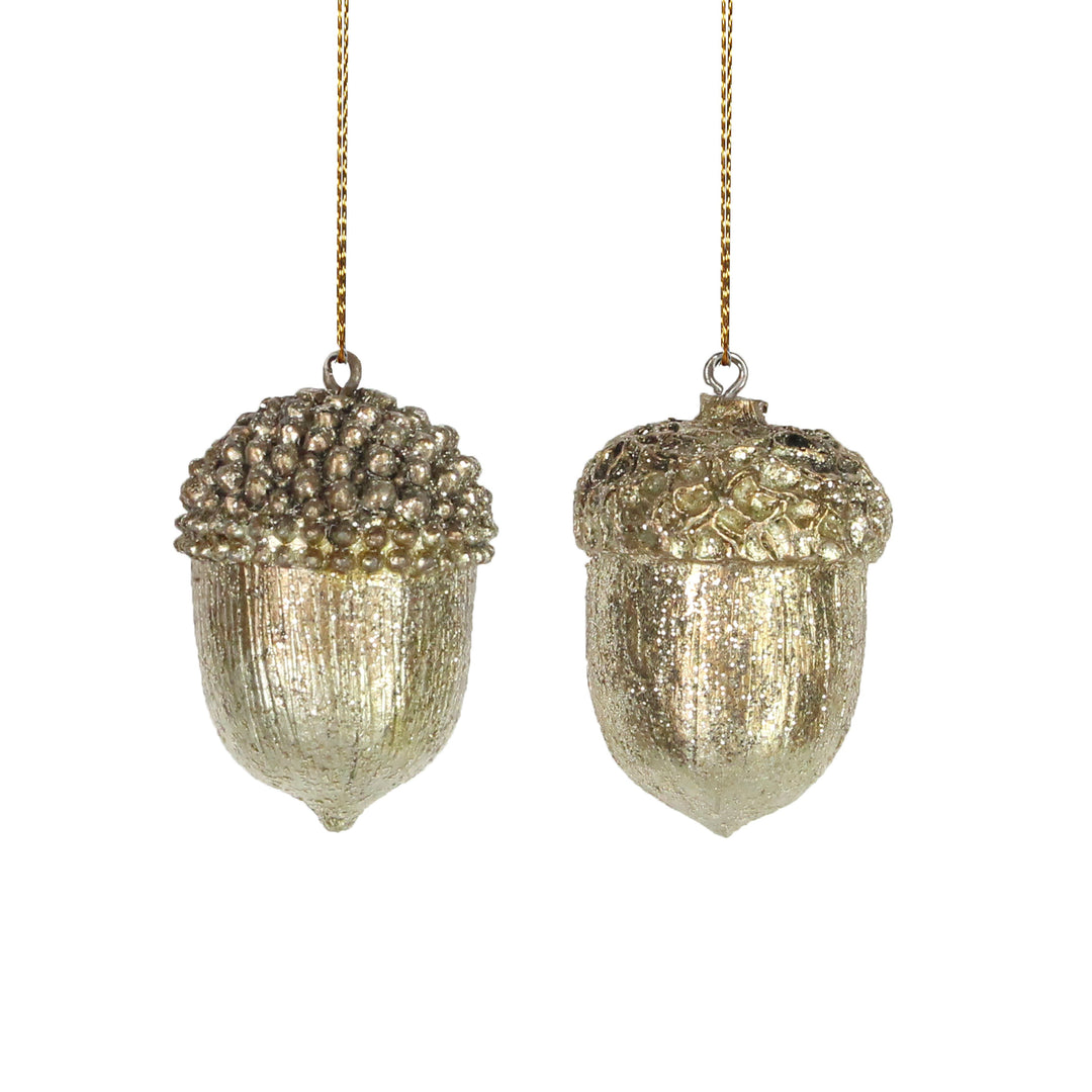 Gold resin acorn decorations with two assorted designs, perfect for Christmas, by Gisela Graham for Cornucopia Home and Gift.