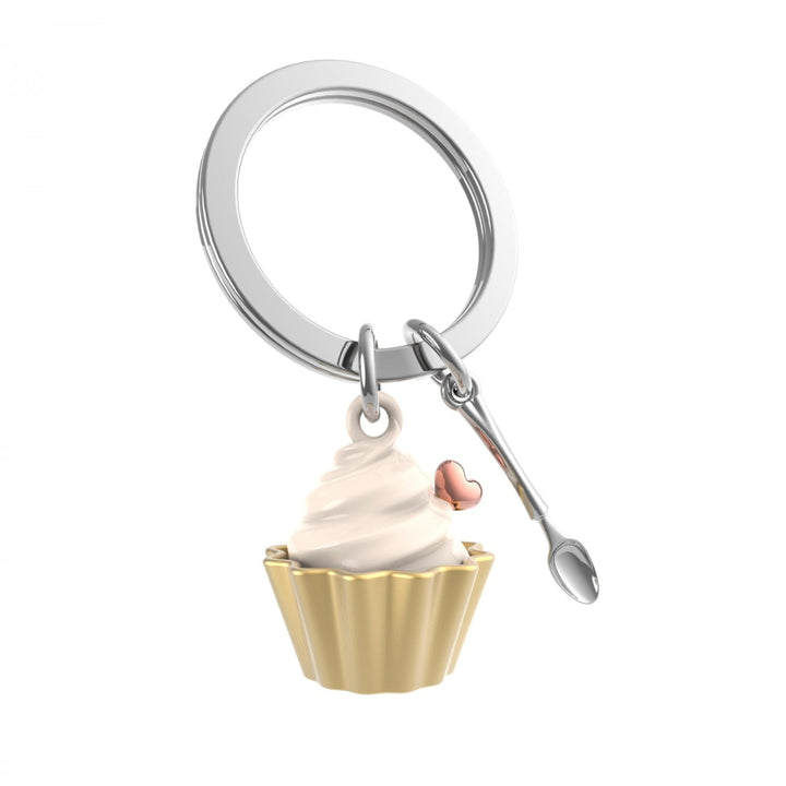 Gold cupcake and spoon keyring by Oli Olsen, featuring detailed cupcake and spoon charms for decorative key accessories.