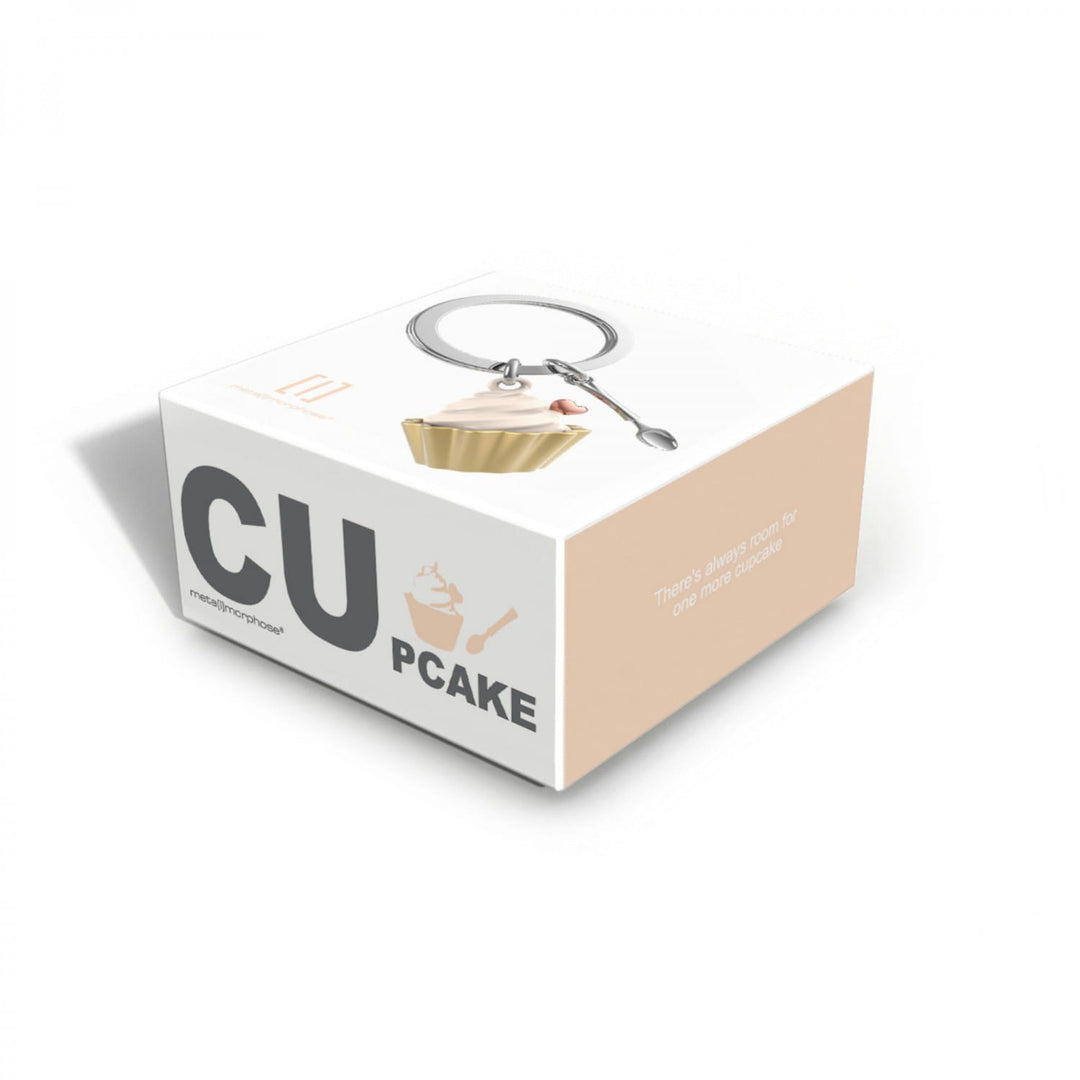 Gold cupcake and spoon keyring by Oli Olsen featuring detailed charms for decorative use.