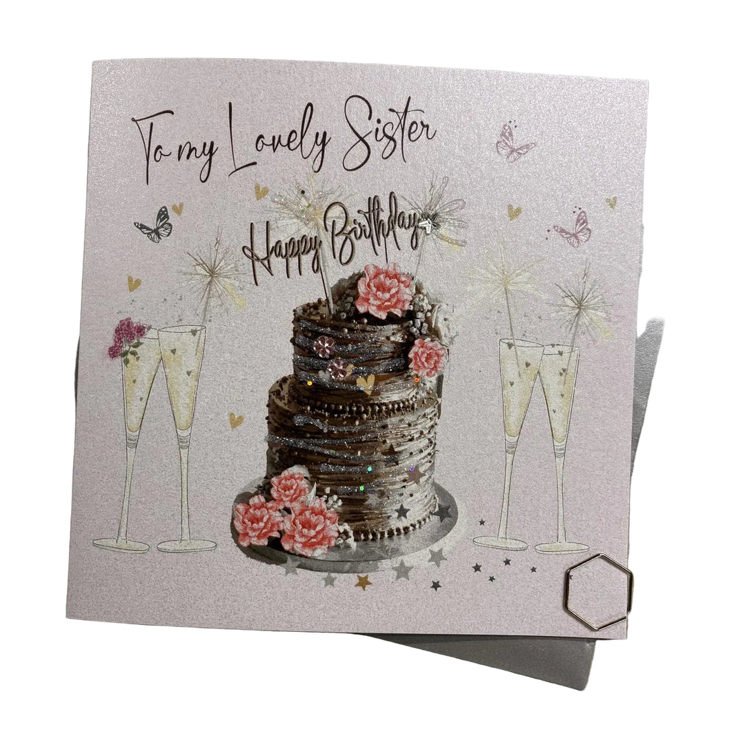 White cotton birthday card from Cornucopia Home and Gift, featuring a festive design for sister's birthday celebration.