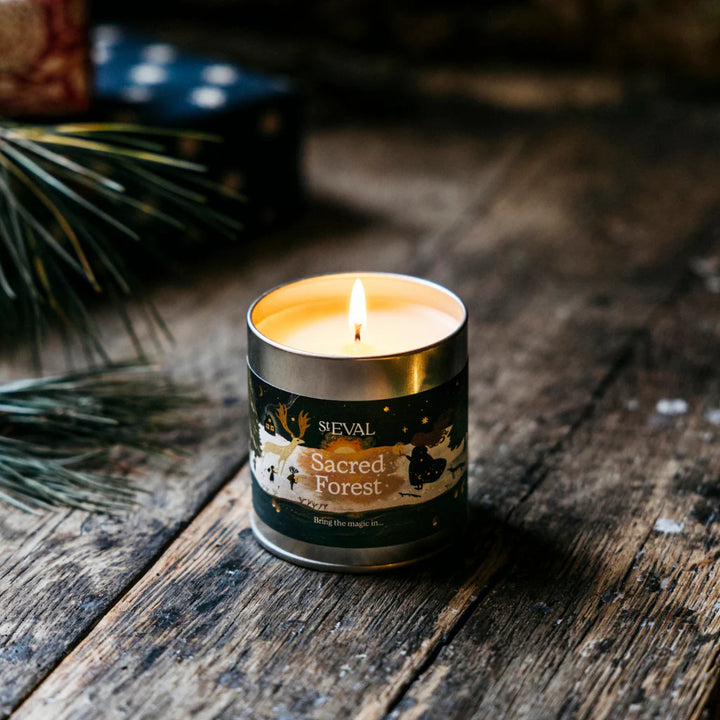 St Eval Sacred Forest scented tin candle by Cornucopia Home and Gift, featuring a festive forest design on a small metal candle tin.