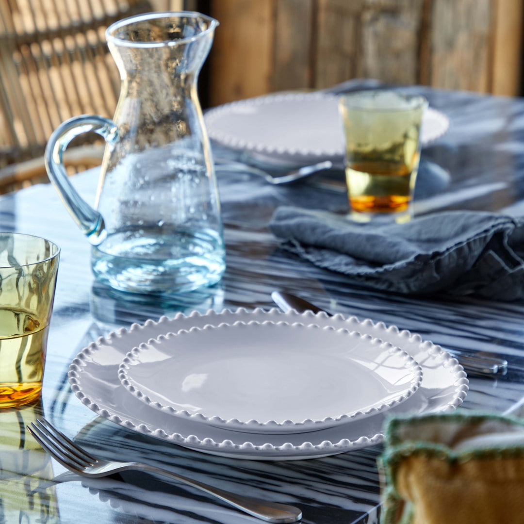 Pearl white dinner plate from My Gifts Trade by Cornucopia Worcester, showcasing a smooth, glossy ceramic surface.