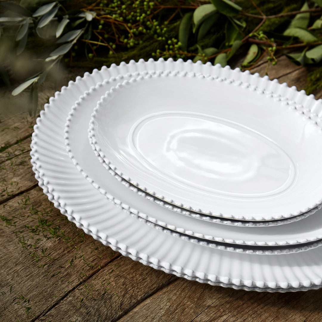 Pearl white oval platter by Cornucopia Home and Gift, 34cm diameter, smooth ceramic serving platter for salads or appetizers.