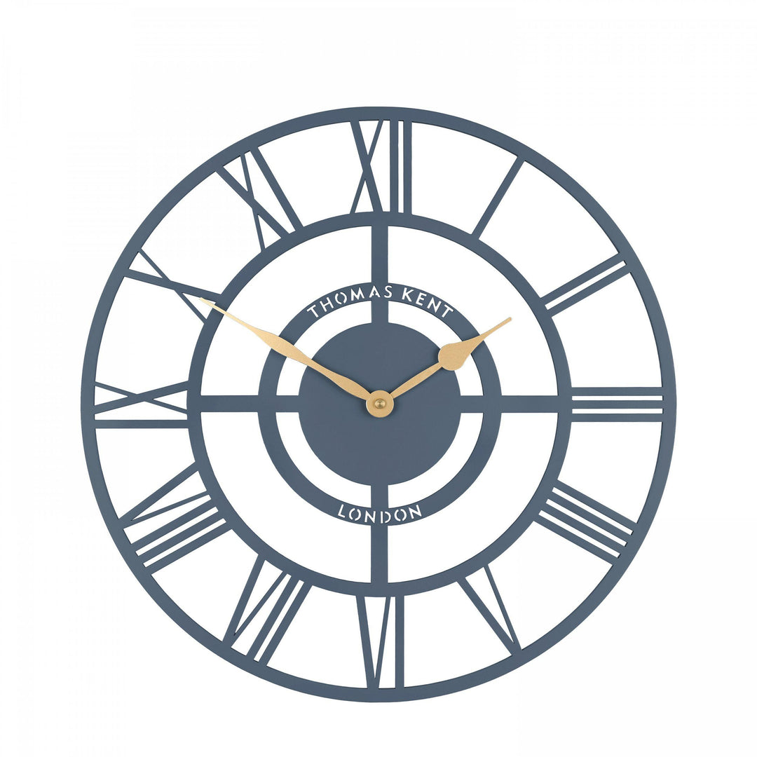 Bright Star Wall Clock in Deep Sea color by Cornucopia Home and Gift, featuring a nautical-inspired design with bold numbers and star accents.
