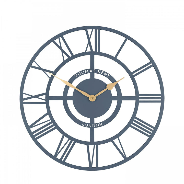 Bright Star Wall Clock in Deep Sea color by Cornucopia Home and Gift, featuring a nautical-inspired design with bold numbers and star accents.