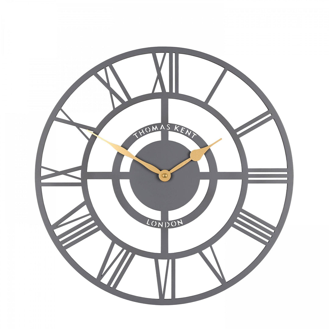 Slate wall clock with a bright star design, 16 inches, by Cornucopia Home and Gift, perfect for modern home decor.