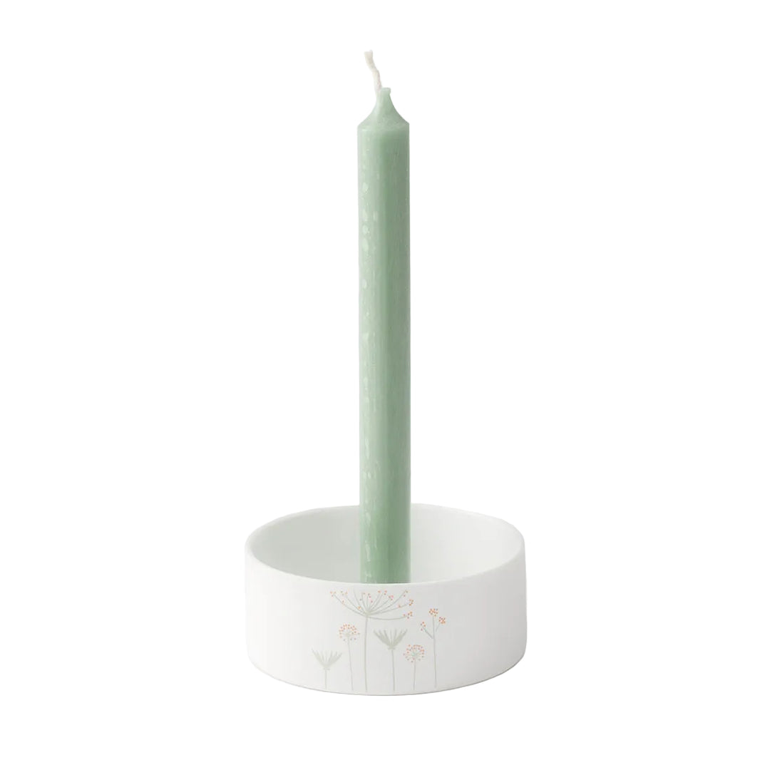 Mini porcelain wreath candle holder by Radër from Cornucopia Home and Gift, featuring a delicate wreath design in white porcelain.