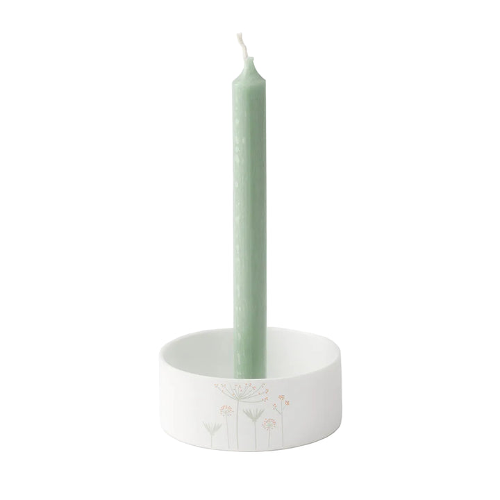 Mini porcelain wreath candle holder by Radër from Cornucopia Home and Gift, featuring a delicate wreath design in white porcelain.