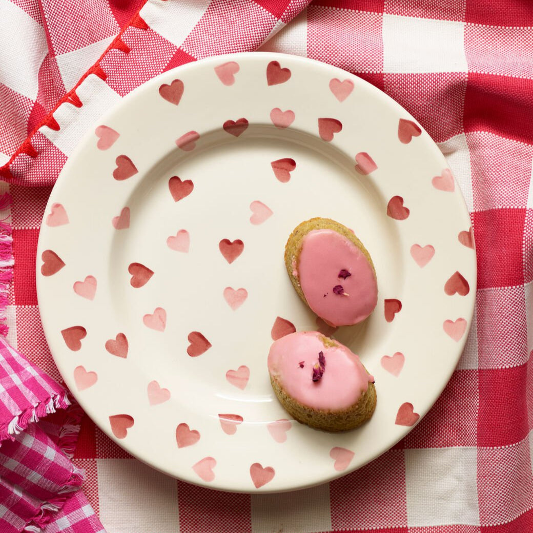 Emma Bridgewater Pink Hearts 10.5-inch decorative plate with pink heart pattern on white ceramic, detailed floral border design.