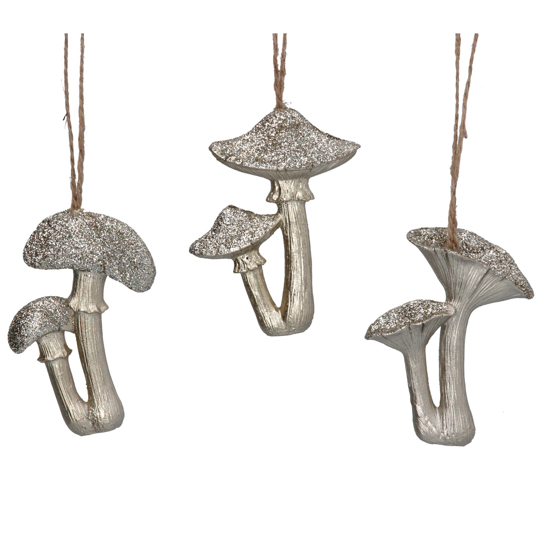 Pale gold glitter resin toadstool decorations in three assorted sizes, perfect for Gisela Graham Christmas decor.