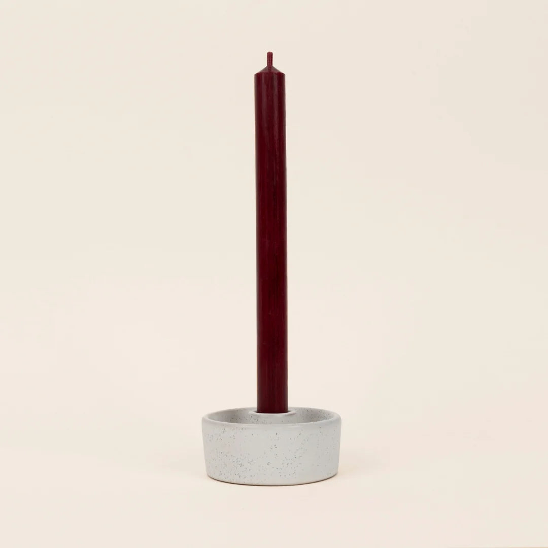Red St Eval dinner candle with a tall, elegant shape and smooth wax finish, perfect for table settings or decorative use.