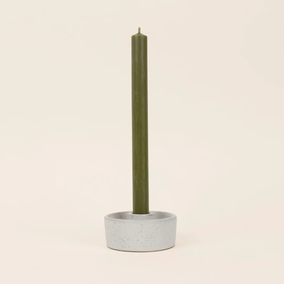 St Eval Olive Dinner Candle from Cornucopia Home and Gift, displaying a polished green candle with olive design details.