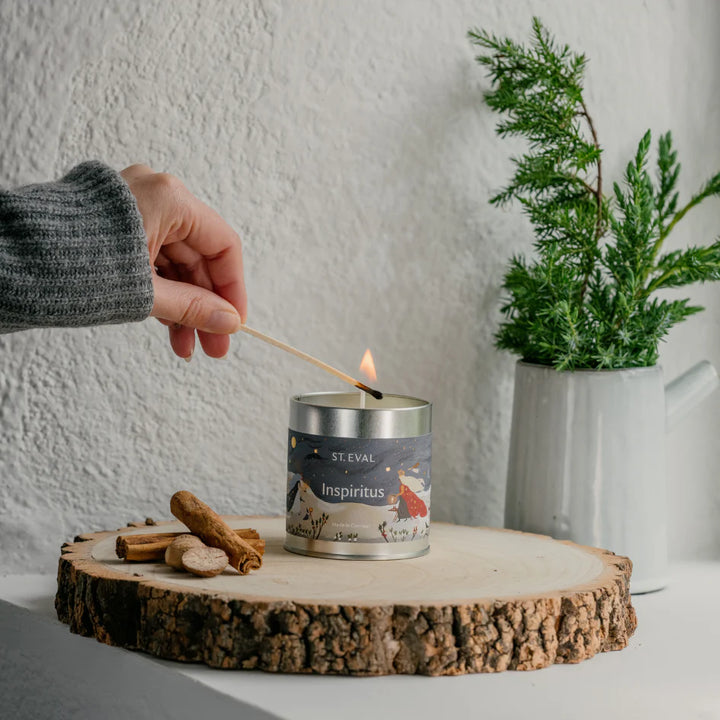 St Eval Christmas Inspiritus scented tin candle with festive holiday design in a metal container, ideal for seasonal home decor