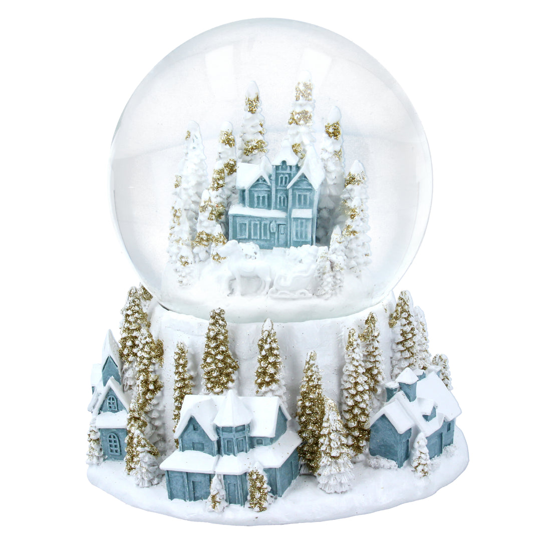 Gisela Graham Christmas village dome in white, blue, and gold featuring festive holiday scene and intricate details.