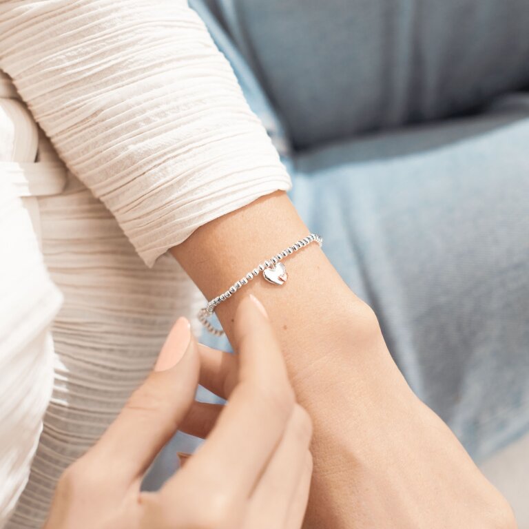 Joma Jewellery Little Mummy To Be Bracelet featuring a cute mummy charm on a silver chain, perfect for expecting moms.