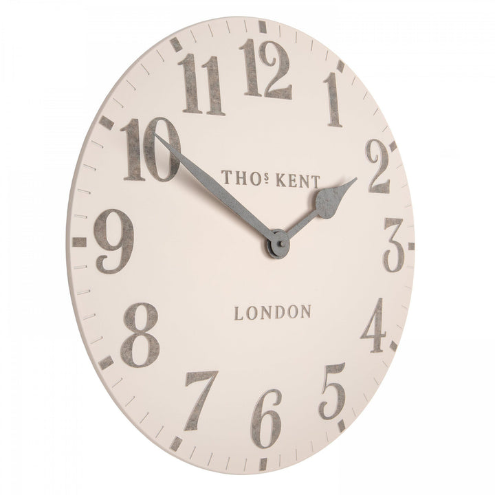 20-foot Arabic wall clock in shy pink, modern art design by Cornucopia Home and Gift, featuring bold white Arabic numerals and sleek style.